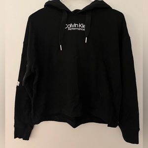 Black Calvin Klein sweater. Never worn.